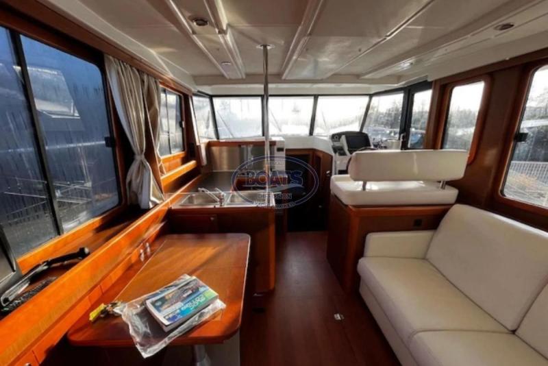 Bateau moteur Beneteau Swift Trawler 34 2014 exterieur 3