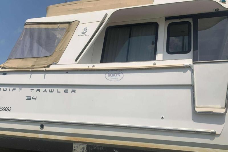 Bateau moteur Beneteau Swift Trawler 34 2014 exterieur 8